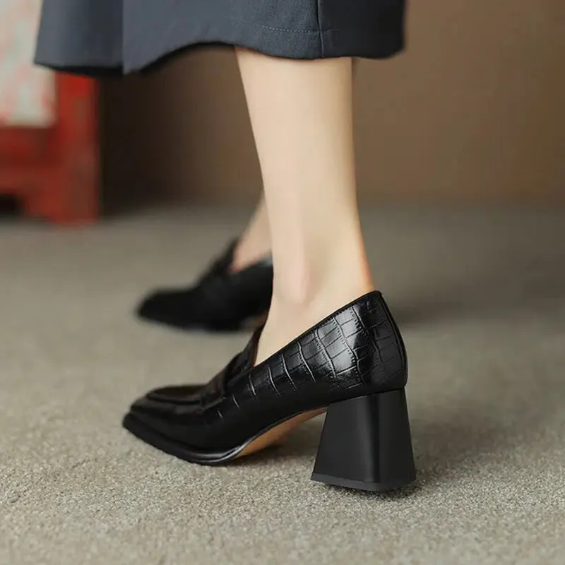 Black heeled loafer