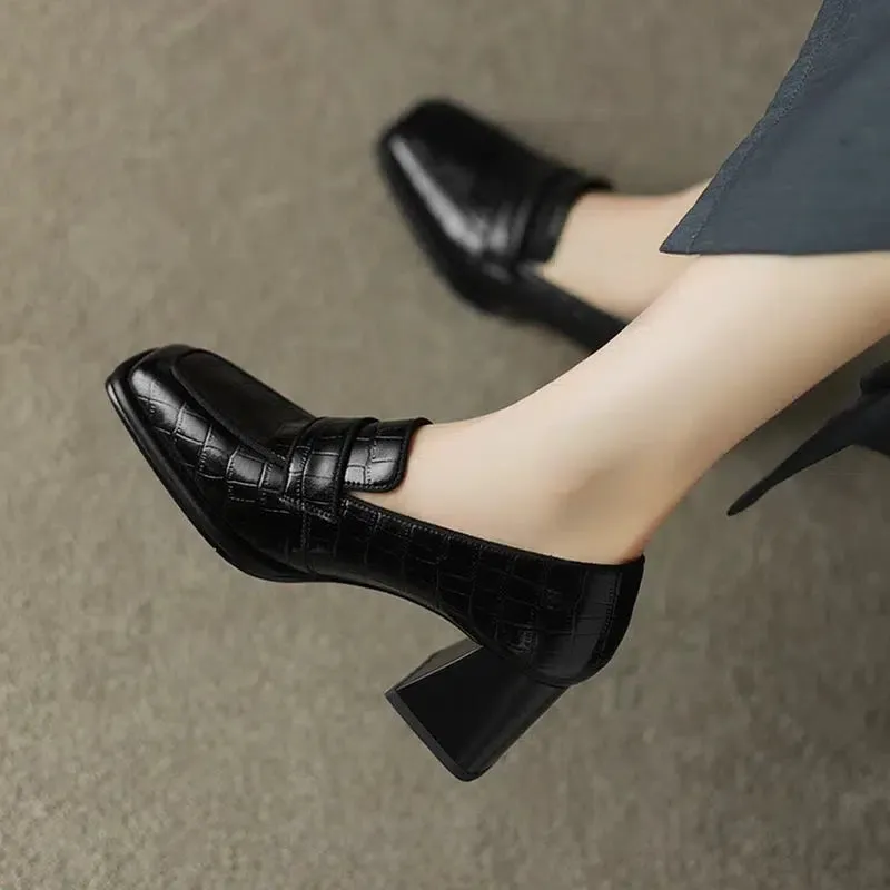 Black heeled loafer
